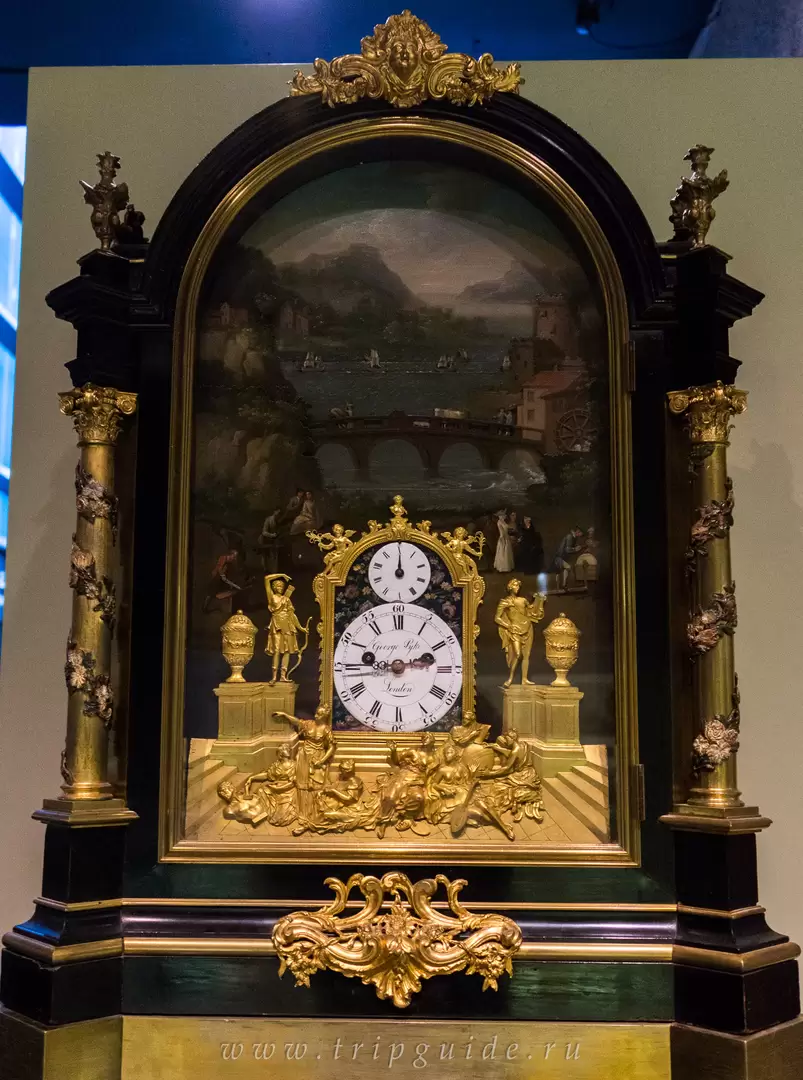 Музыкальные часы, около 1760, Джорж Пайк (George Pyke) были оснащены органом, который мог играть 10 мелодий, расписной циферблат с движущимися частями Музыкальные часы, около 1760, Джорж Пайк (George Pyke) были оснащены органом, который мог играть 10 мелодий, расписной циферблат с движущимися частями